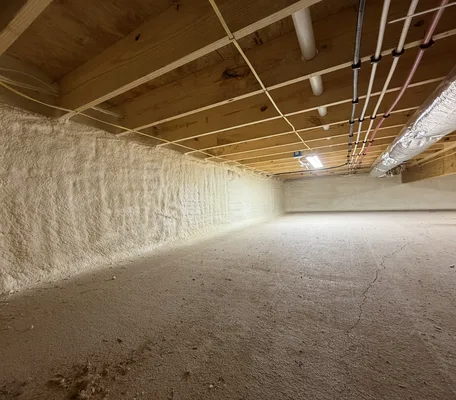 Encapsulated crawl space with spray foam insulation on the foundation walls of a Pennsylvania home