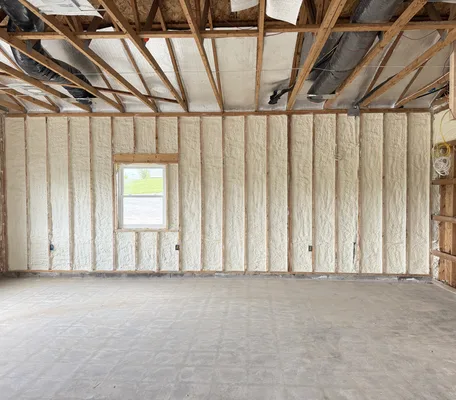 Spray foam insulation filling the wall cavities between studs on a Central PA Spray Foam project